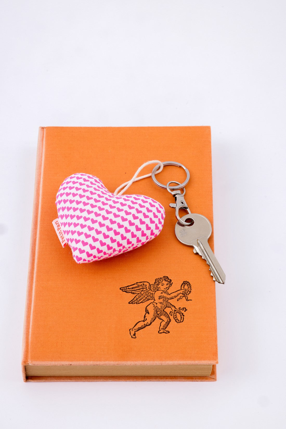 Grigri coeur Love is all rose