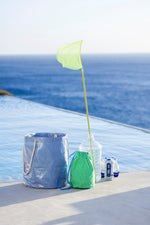 Sac de piscine Mimoun vert avec des motifs géométriques arrondis