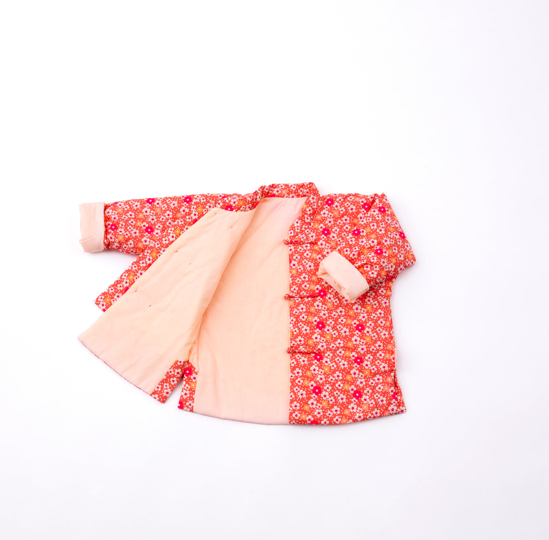 Veste molletonnée enfant Fleurs des îles rose sables
