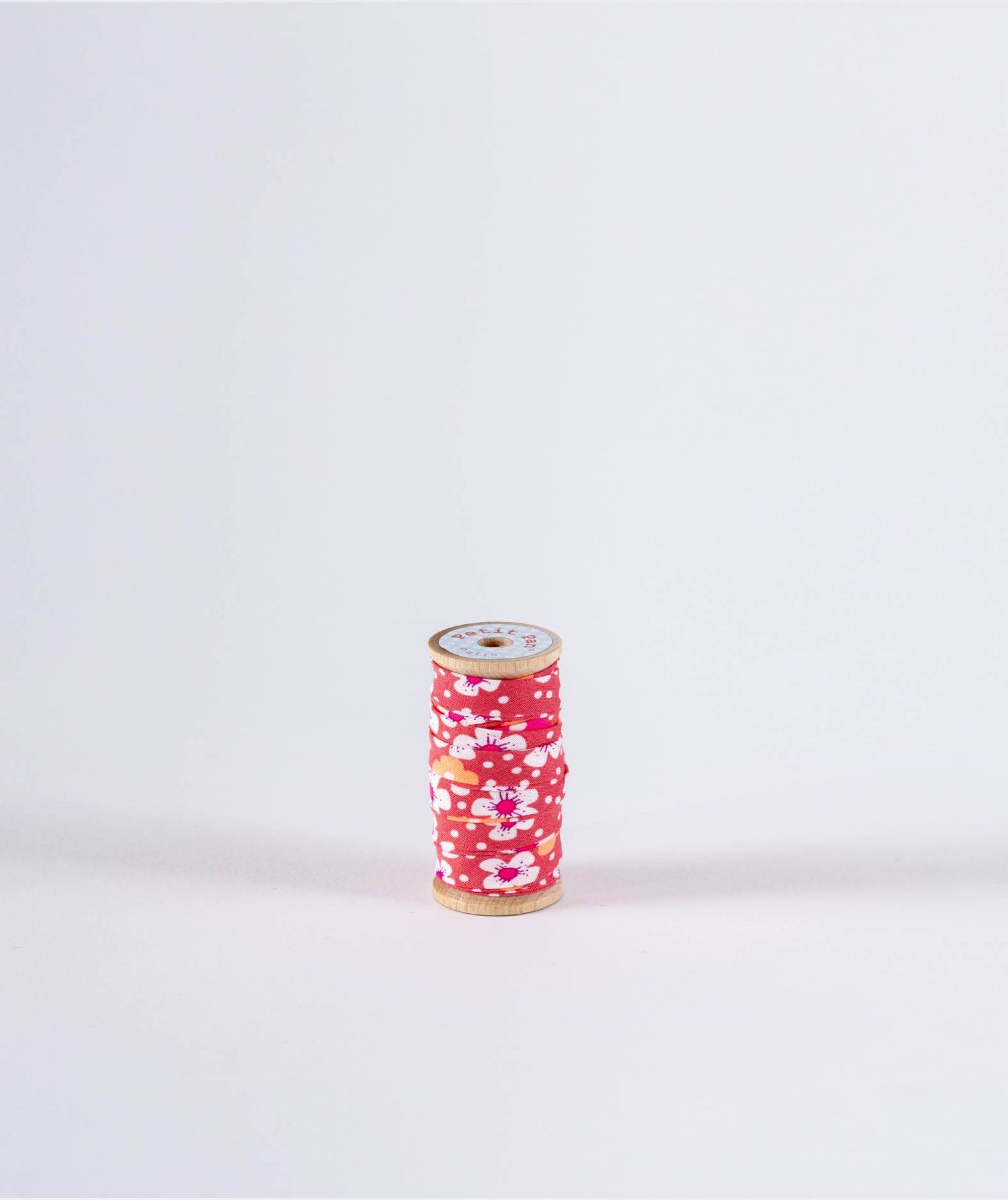 Bobine de biais 2,5m Fleurs des îles rose sable